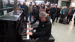 Epic Piano Battle Brings Crowd To A Standstill [upl. by Retnyw406]